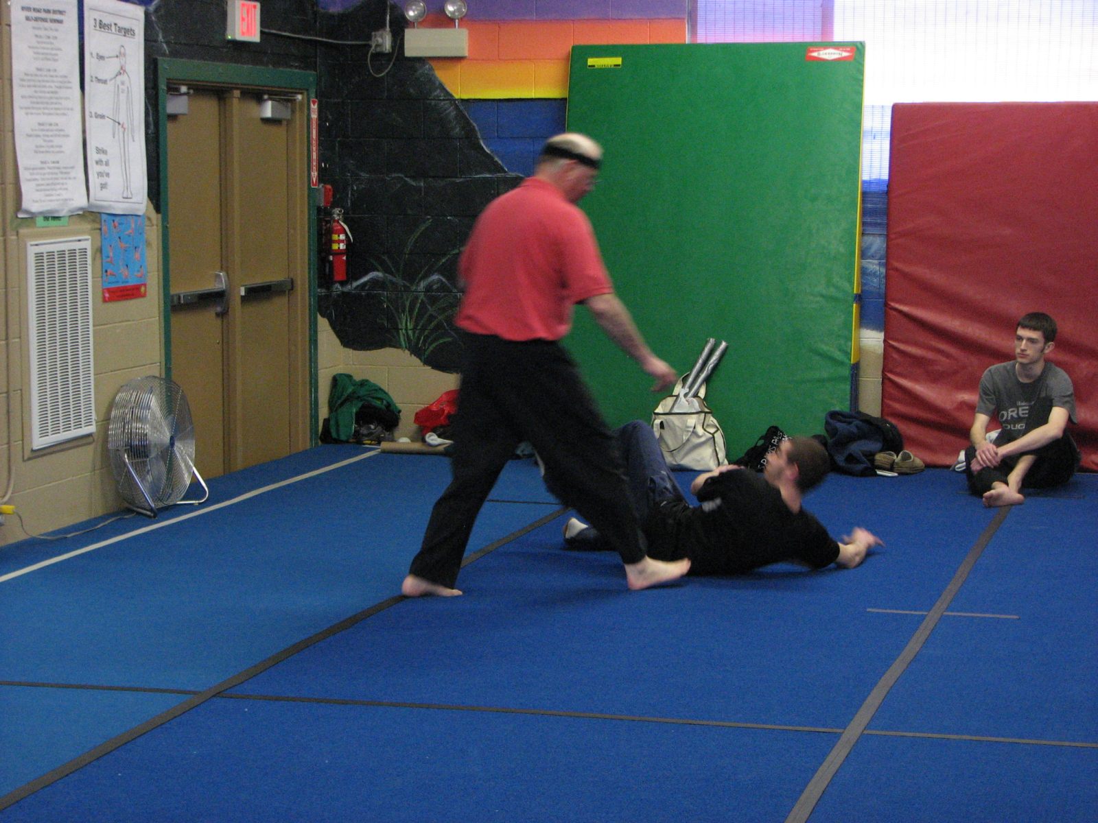 091 An assitant gets introduced to the mat